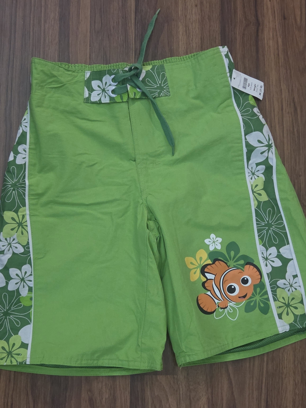 Disney Finding Nemo Bright Green Swim Trunks with Floral Trim